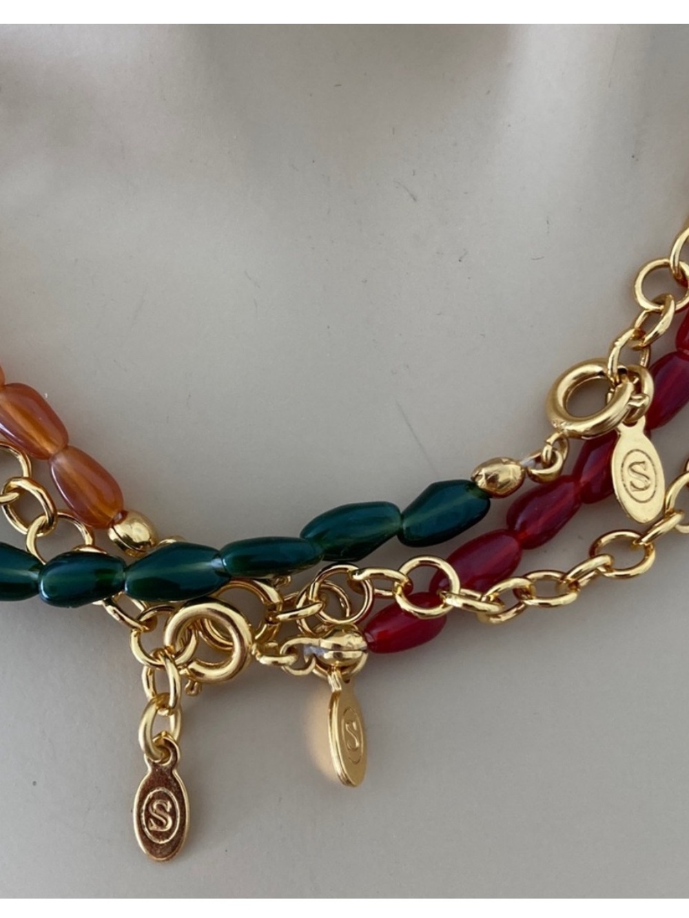 Sezane Flora Earrings, Amandine Bracelet and Clem Necklace
Color: Carmine Red - Picture 11 of 14
